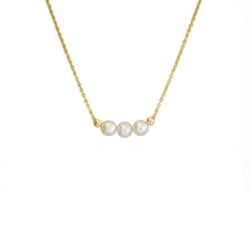 Three pearl necklaces for women